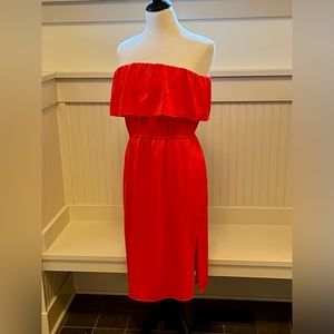 BCBG Red Strapless Ruffle Dress. Lightweight, lined satin w/ slit. Knee-length.